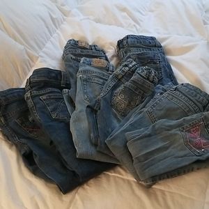 8 pairs of Jean's, all size 5. Various Brands.